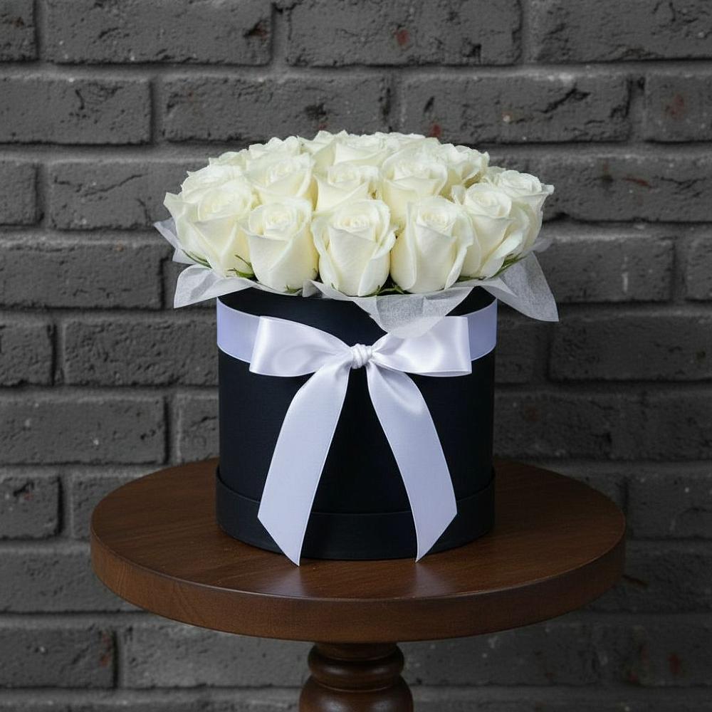 Цветочная композиция из Розы в шляпной коробке в Балтаси